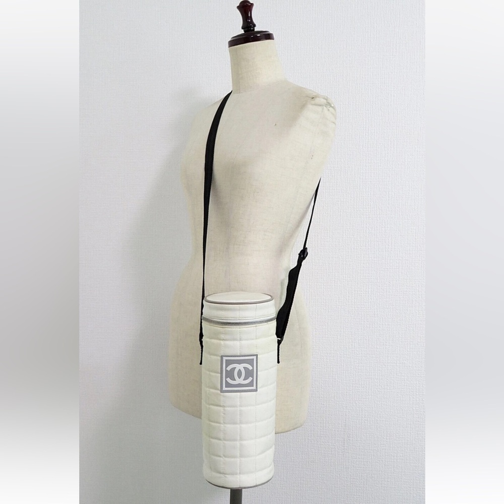 CHANEL White Quilted Bottle Carrier with Black Strap